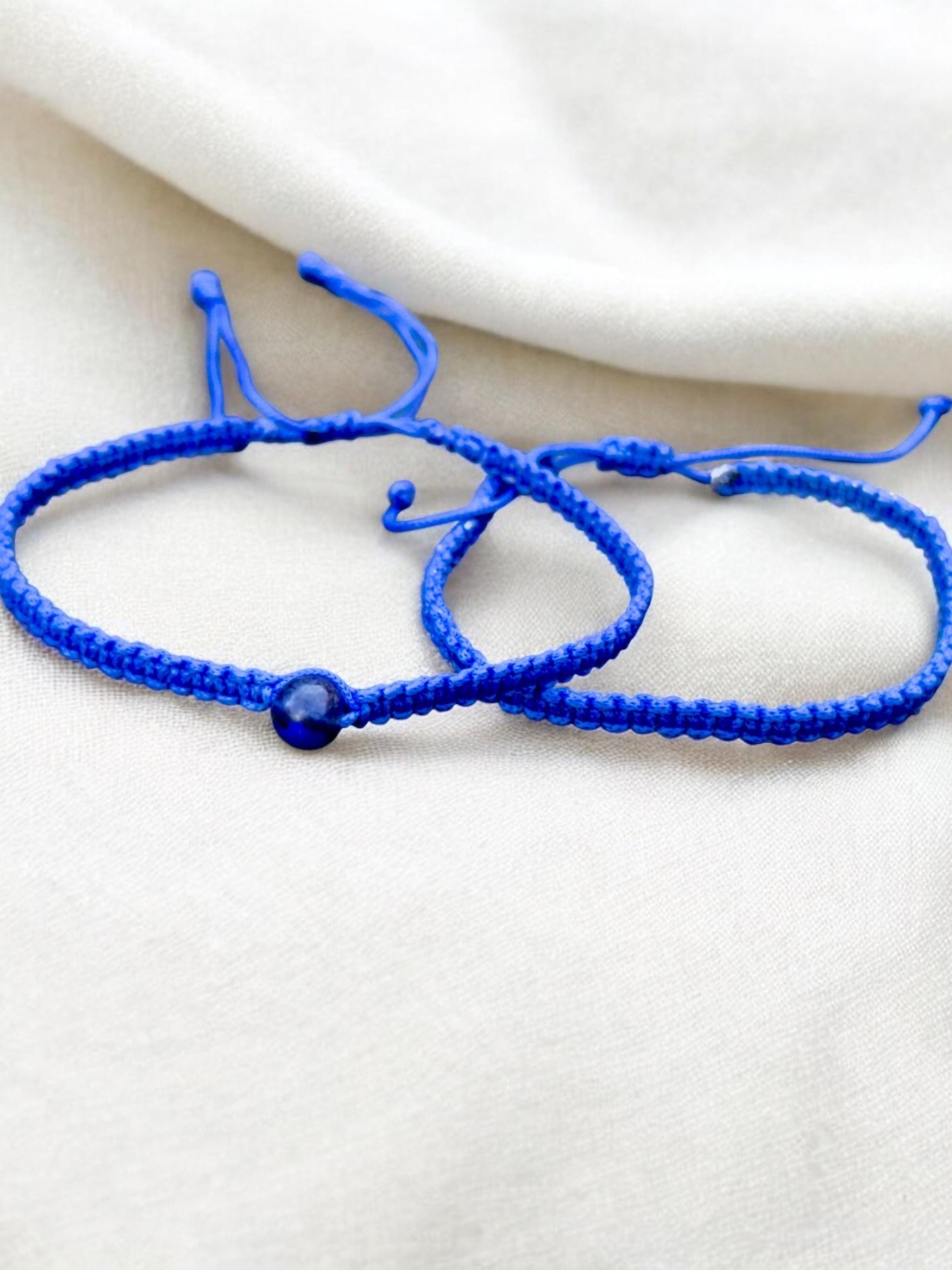 Two blue macrame adjustable friendship bracelets