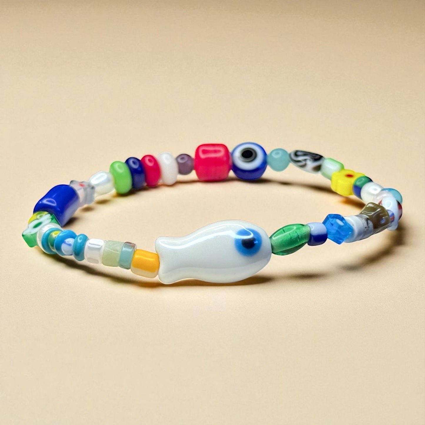 Evil Eye Fish Charm Bracelet: Freshwater Pearls & Glass Beads